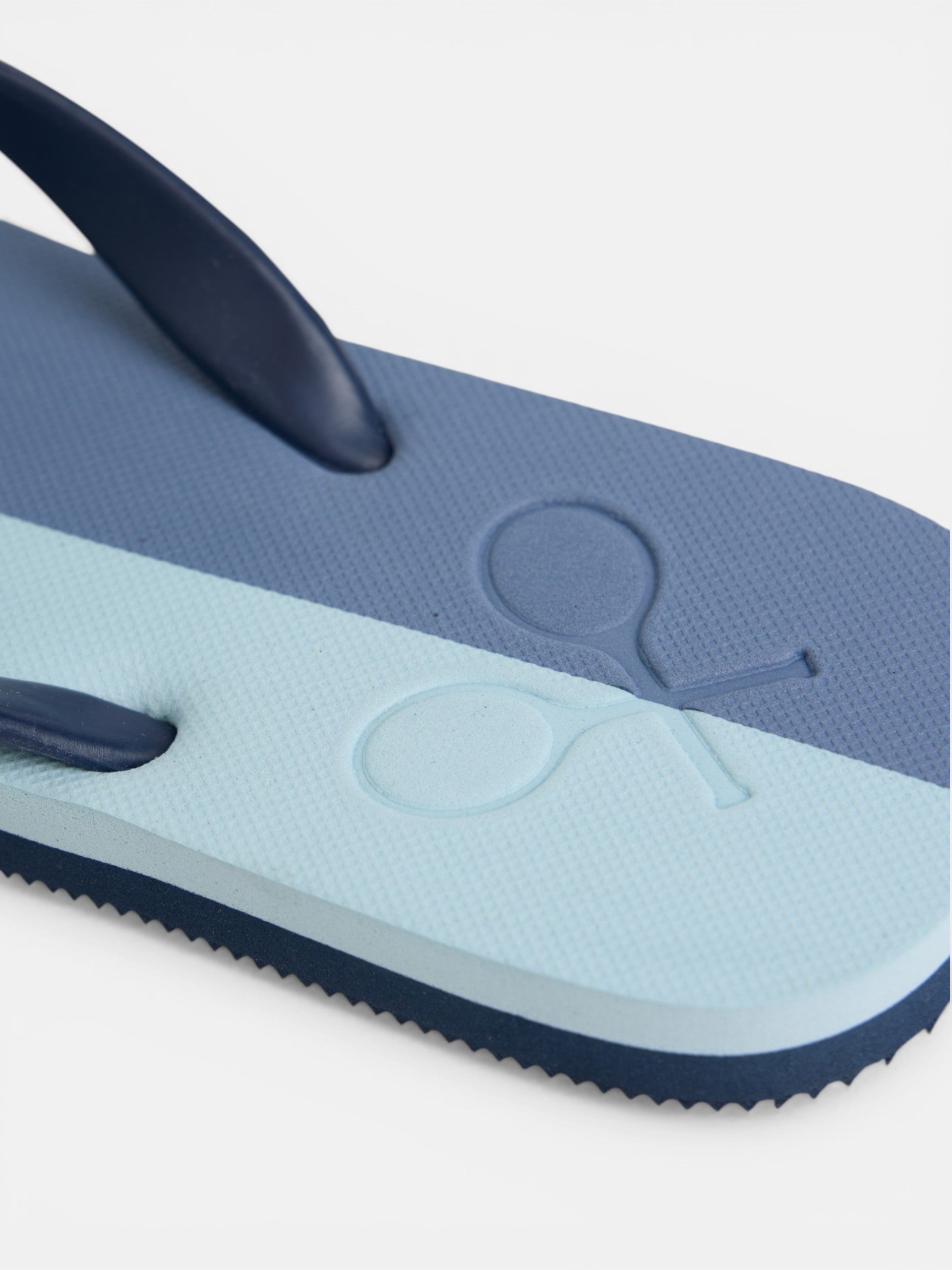 Two-tone blue paddle flip-flops