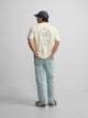 Camiseta special fit le champs crema