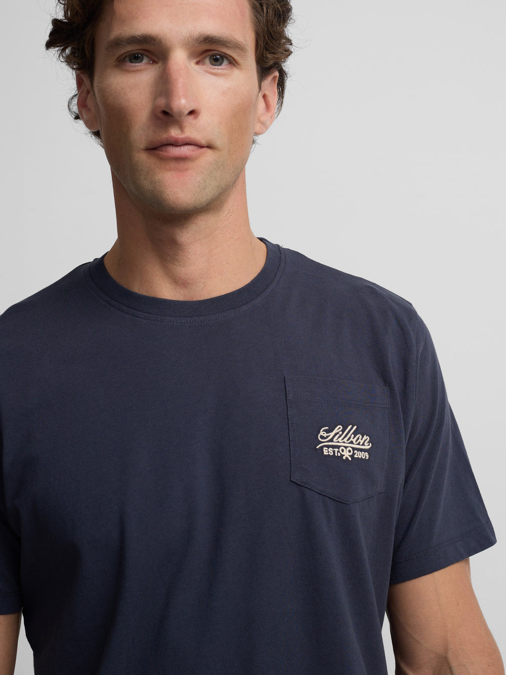 Navy blue garment dye pocket t-shirt