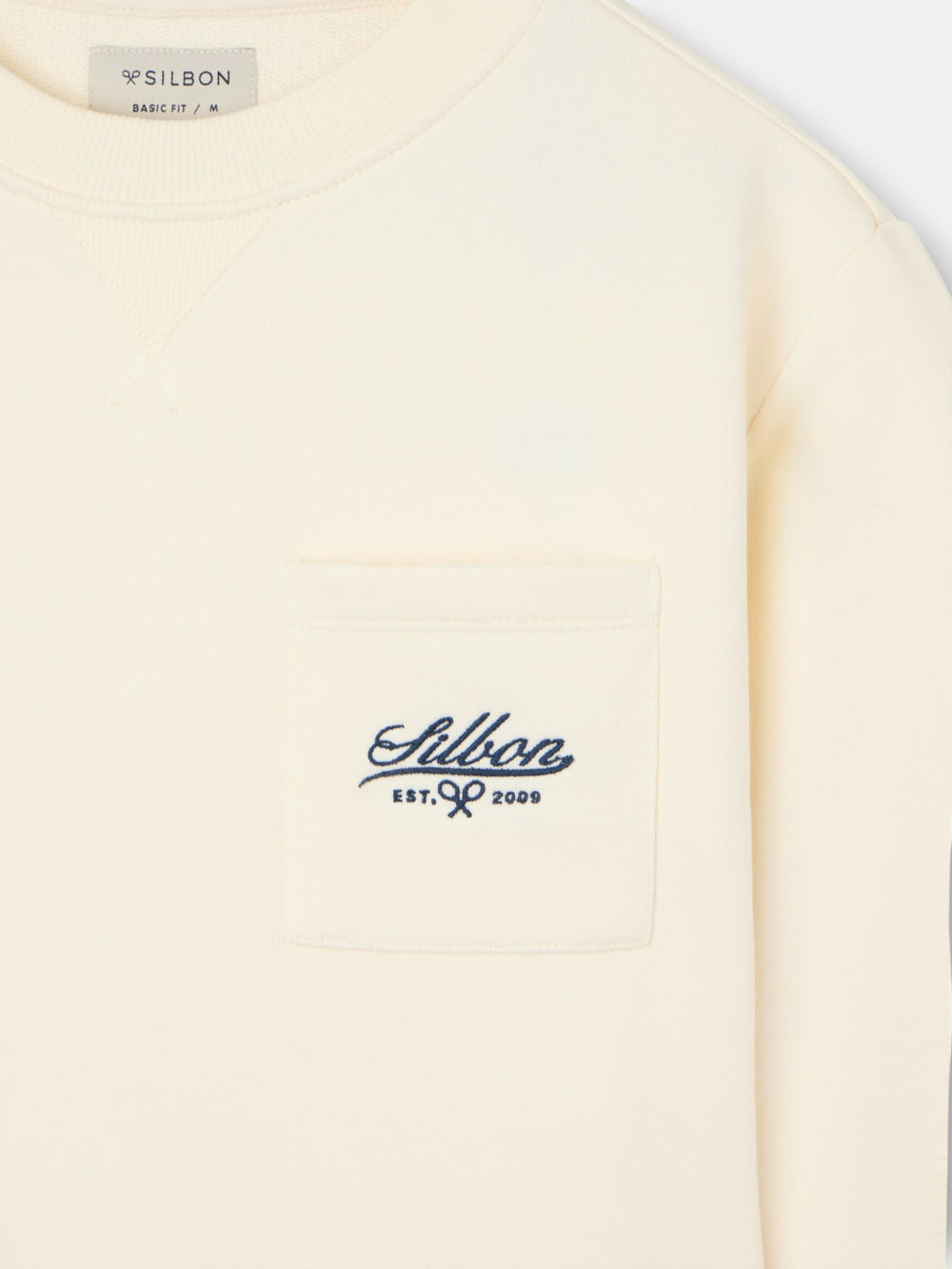 Sweat-shirt crème à poche brodée