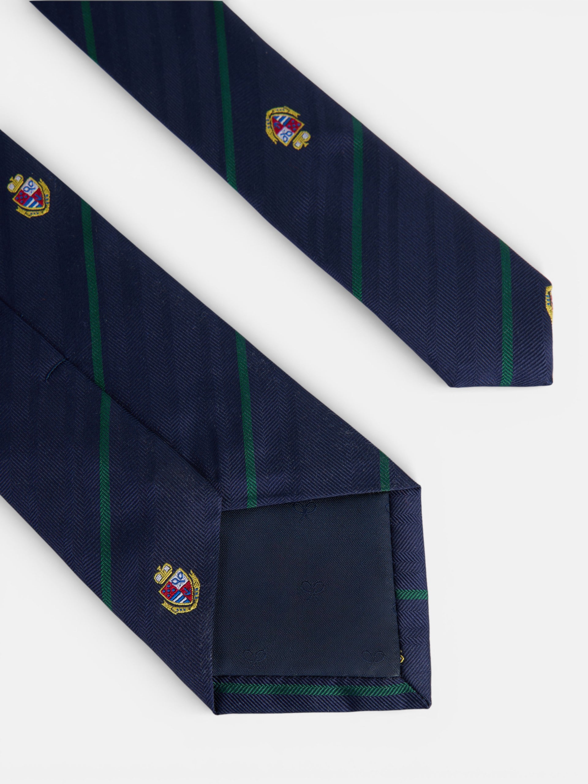 Corbata rayas escudos azul marino