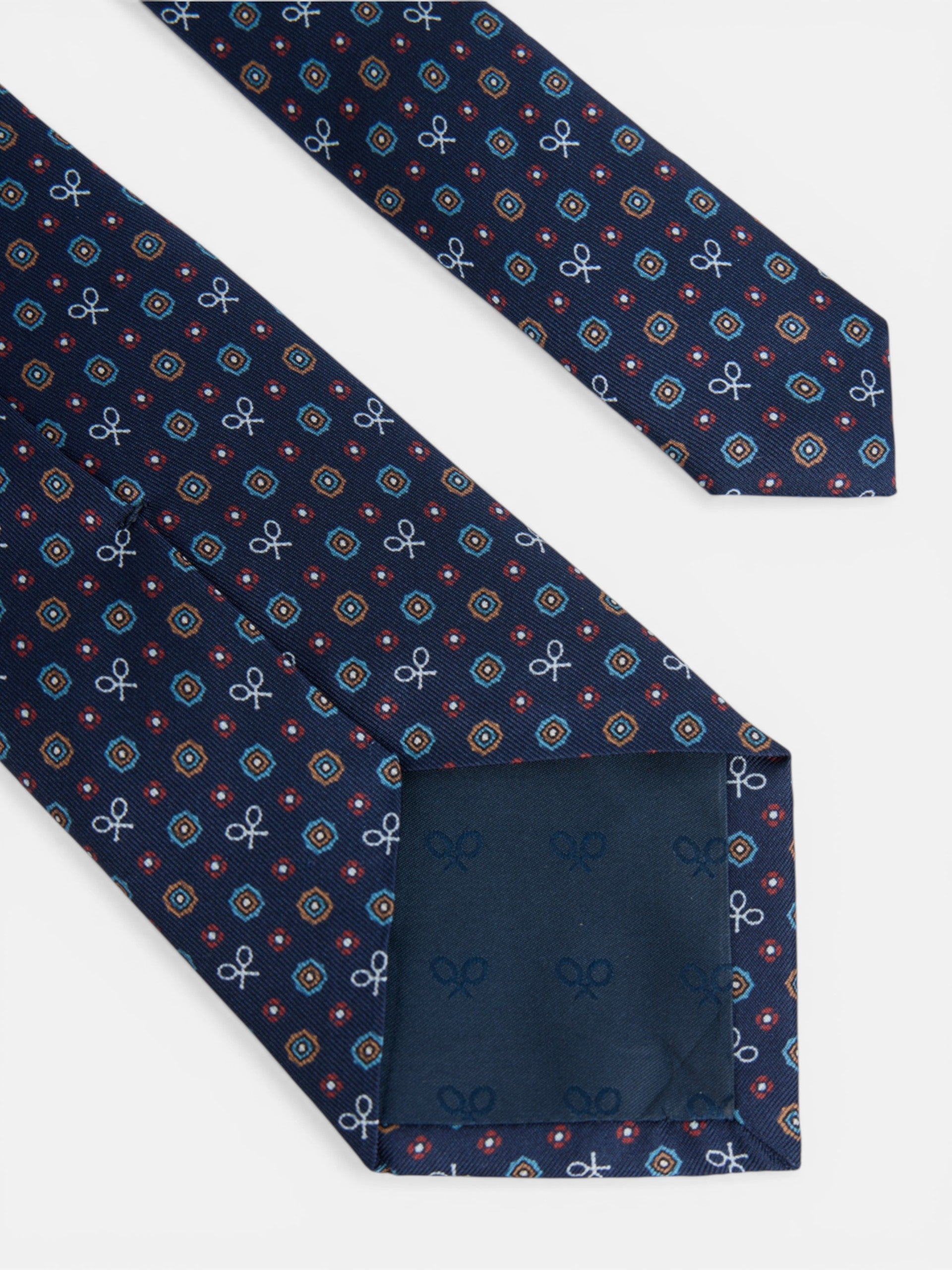 Corbata raquetas motivos geometricos azul marino