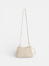 Gathered leather bag with chain detail in off-white