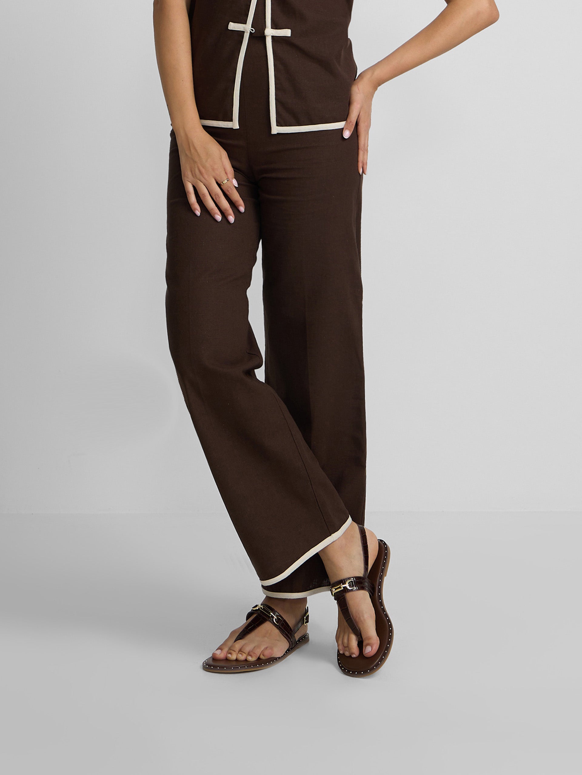 Straight brown linen trousers