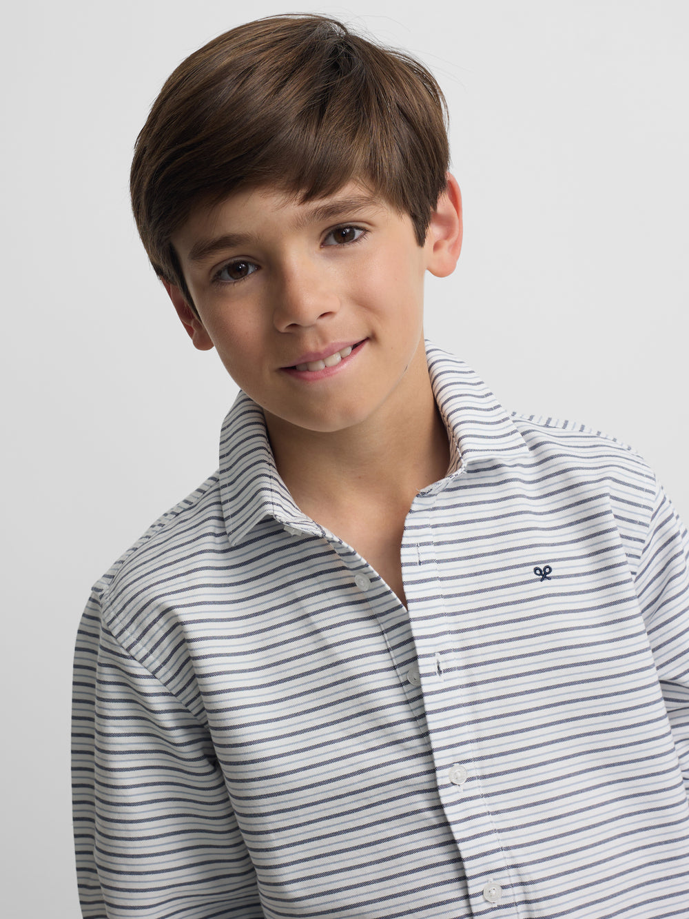 Polera sport kids oxford raya crema azul marino