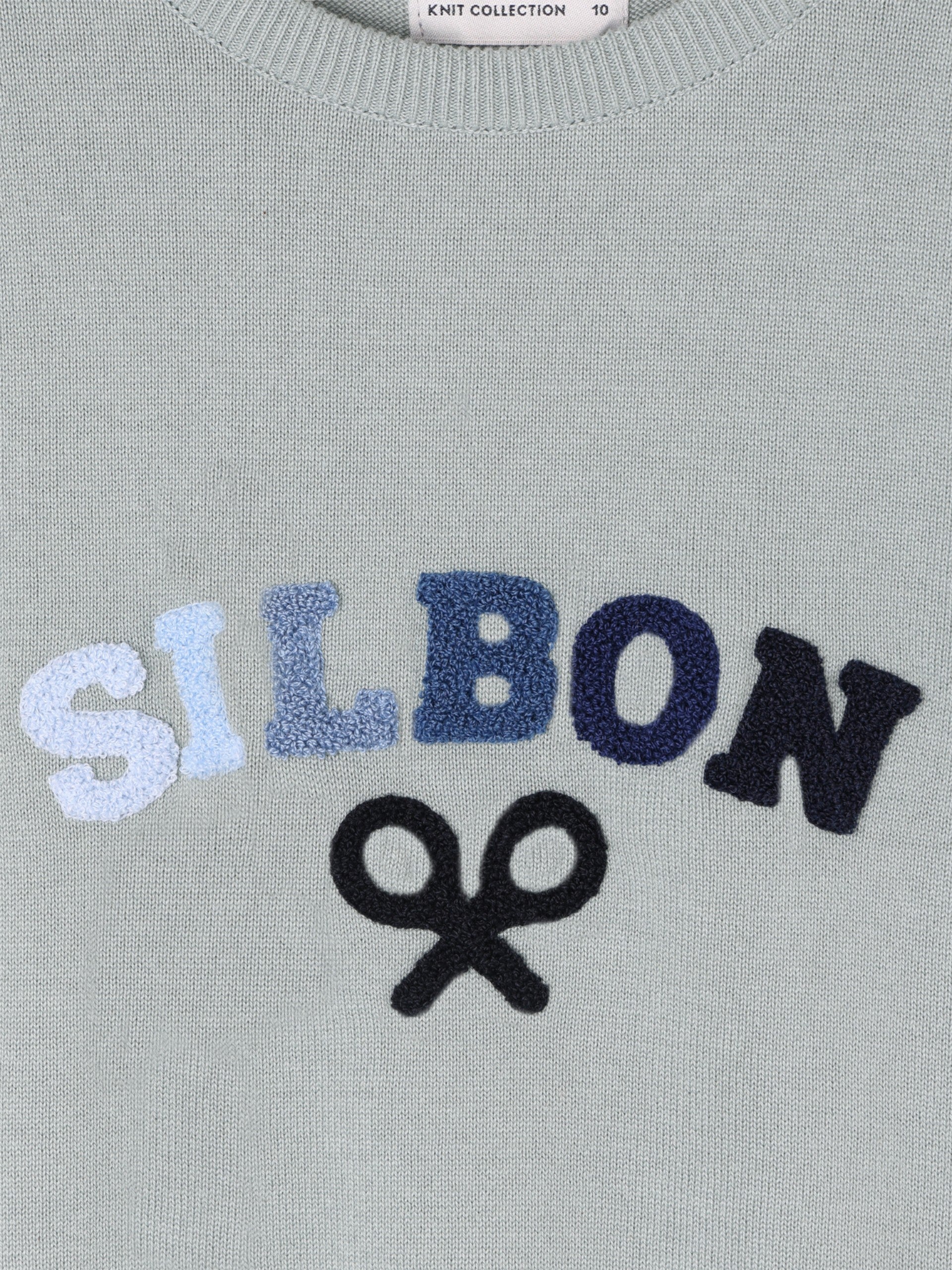 Kids sweater with colored letters in green