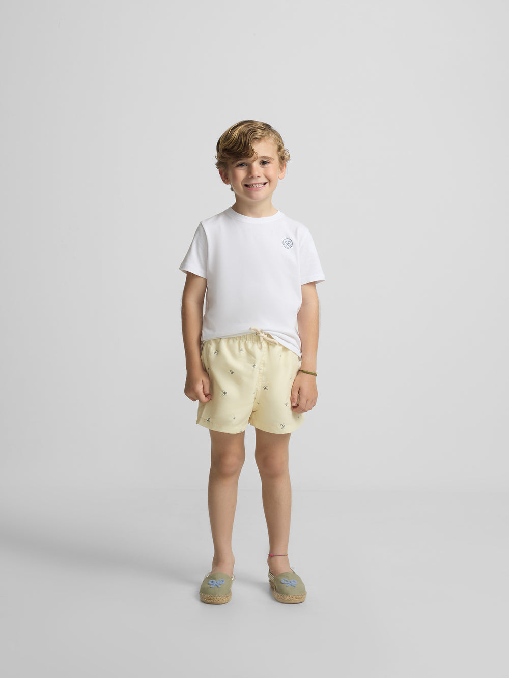 Kids yellow multiracket swimsuit